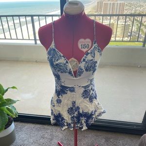 Adorable blue and white floral romper